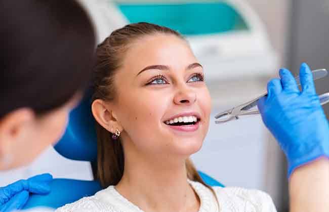 Woman about to undergo tooth extraction in Kent, WA